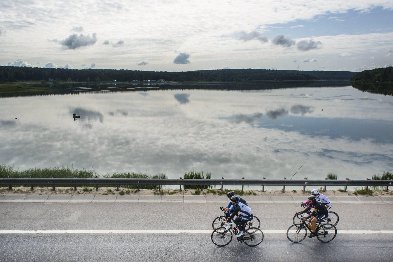 riders-pass-a-lake-during-the-red-bull-trans-siberian-extreme-race-stage-one